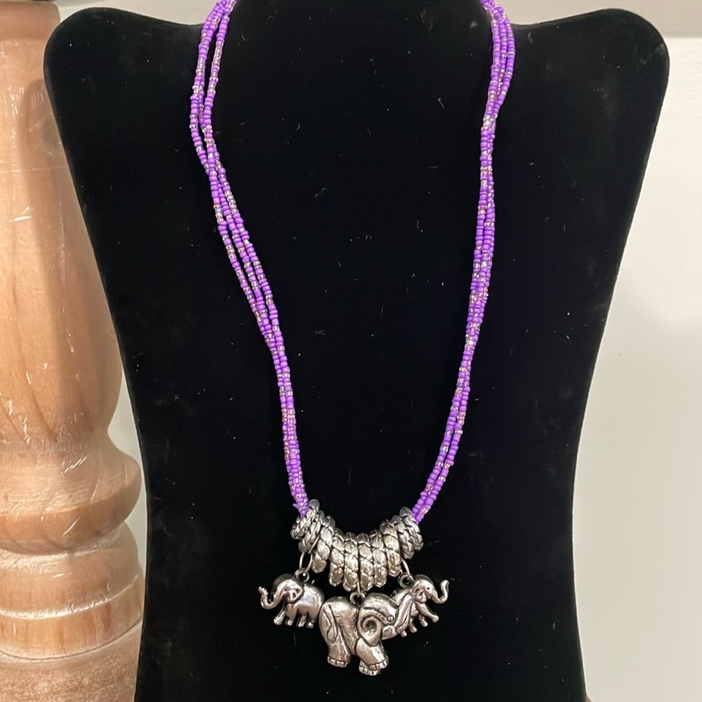 Purple seed bead triple strand Elephant trunk up necklace vintage